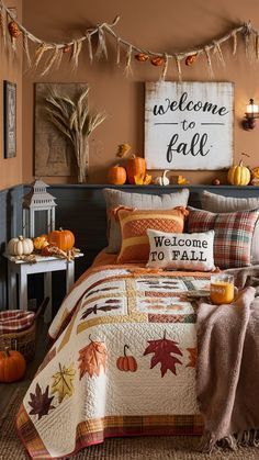 a bedroom decorated for fall with pumpkins and decorations