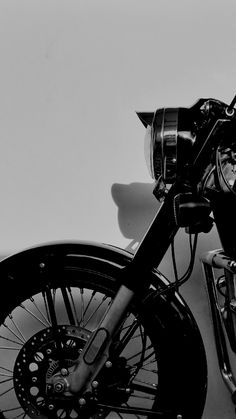 a black and white photo of a motorcycle