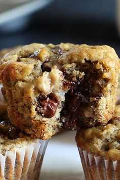 two chocolate chip muffins on a plate with the words banana express above them