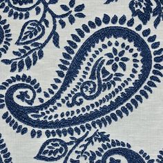 a blue and white paisley print fabric