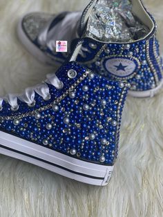 Custom Bling Converse All Star Chuck Taylor Sneakers. All designs handmade and embellished with a variety of high-quality crystals. Good for weddings, proms, homecomings, birthdays, special events or just your everyday girly girl. Shoe Details: Classic blue high-top Converse All Star Chuck Taylor Sneaker (Cloth material style) Shoe Size: starting at women's size 5 to women's size 12; Size availability may vary based on our supplier's current inventory. If your size is out of stock at the time of Sweet 16 Converse, Blue Rhinestone Shoes, Badazzel Converse, Custom High Top Converse, Eras Tour Shoes Diy, Wedding Chucks Converse, Bejeweled Converse, Quinceanera Converse, Bedazzle Sneakers