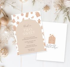 two different types of wedding cards on top of a white table with ornaments and decorations