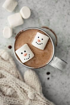 hot chocolate with marshmallows in the shape of snowmen