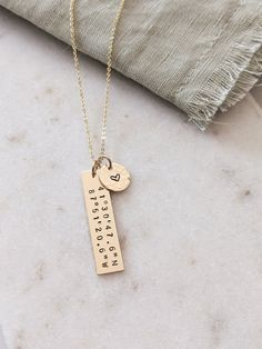 "14k Gold Filled or Sterling Silver Custom coordinates necklace, Personalized bar necklace, Coordinates jewelry, Latitude Longitude, Anniversary Gift for her, Gift for wife, Wanderlust, Special Place necklace Keep your special location coordinates close to your heart. The perfect gift. ♡ I can fit up to 21 characters including spaces and coordinates symbols. D E T A I L S * Gold Filled: Gold Filled Disc, Clasp and Chain. * Sterling: .925 Sterling Silver Disc, Clasp and Chain. P E N D A N T S * 3 Coordinates Necklace, Personalized Bar Necklace, Coordinates Jewelry, Cotton Box, Bar Necklace Personalized, Latitude Longitude, Anniversary Gift For Her, Necklace Personalized