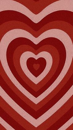 a red and white heart shaped pattern on a pink background with an orange stripe in the middle