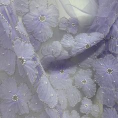 Beaded 3D Floral Lace Fabric Embroidered on 100% Polyester Net Mesh | Lace USA - GD-216 Elegant Embroidered Fabric With Floral Applique For Party, Elegant Organza Fabric With 3d Embroidery, Elegant Floral Embellished Lace Fabric, Elegant Embroidered Fabric With Appliques For Party, Party Organza Fabric With Floral Embroidery, Elegant Purple Organza Embroidered Fabric, Purple Embroidered Organza Fabric For Party, Party Tulle Fabric With Pearl Embroidery On Organza, Floral Lace Fabric