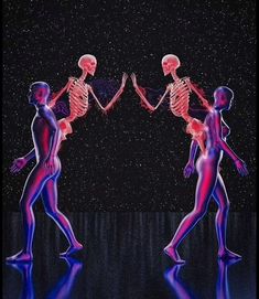 two people are walking in the dark with their body painted red and blue, while one person is holding his hand out