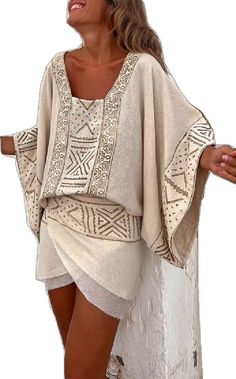 Bohemian Batwing Sleeve Blouse For Summer, Summer Bohemian Blouse With Batwing Sleeves, Oversized Bohemian Tunic Blouse, Oversized Bohemian Tunic Tops, Bohemian Oversized Tunic Tops, Bohemian Batwing Sleeve Blouse For The Beach, Bohemian Batwing Sleeve Blouse For Beach, Beige Bohemian Blouse With Boho Print, Bohemian Oversized Blouse With Batwing Sleeves