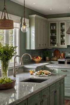 a kitchen filled with lots of counter top space next to a sink and stovetop oven