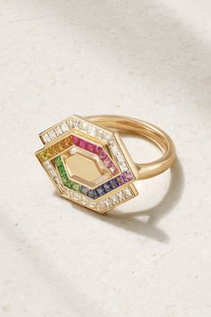 For Robinson Pelham, few things eclipse the beauty of precious stones. Inspired by a bespoke engagement design, the geometric profile of this 'Entwined' ring is cast from 18-karat gold and set with scores of rainbow sapphires, rubies and tsavorites alongside rows of carré and bullet-cut diamonds. It's a joyful way to declare your love to someone special. Robinson Pelham, Engagement Design, Geometric Jewellery, Color Stones Jewelry, Pretty Crafts, Kundan Jewelry, Rainbow Sapphires, Jewels Rings, Razzle Dazzle