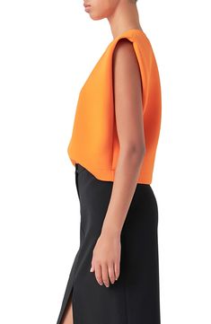 A strong-shoulder silhouette plays against the soft structure of this top that's a modern alternative to your favorite crewneck. Crewneck Sleeveless 45% polyester, 28% nylon, 20% acrylic, 7% wool Hand wash, dry flat Imported Modern Stretch Tank Top For Work, Stretch Crew Neck Sweater Vest For Work, Spring Crew Neck Vest For Work, Spring Workwear Vest With Crew Neck, Modern Spring Tops With Structured Shoulders, Modern Tops With Structured Shoulders For Spring, Modern Spring Workwear Tank Top, Modern Structured Shoulder Tops For Work, Padded Shoulder Tops For Workwear In Fall