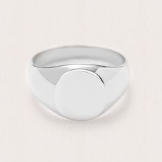 an oval signet ring in white gold