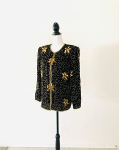 "Excellent vintage condition! Measures 38-40\" inch bust" Vintage Embellished Outerwear For Festive Occasions, Vintage Embroidered Blouse For Party, Vintage Embroidered Party Blouse, Vintage Beaded Evening Outerwear, Vintage Embellished Festive Outerwear, Festive Embellished Vintage Outerwear, Festive Vintage Embellished Outerwear, Festive Vintage Long Sleeve Blouse, Vintage Blouse For Festive Occasions