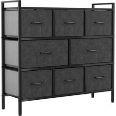 an image of a dresser with drawers and bins on the bottom shelf in black