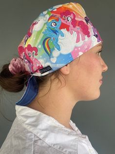 My Little Pony Scrub Cap - handmade from 100% cotton fabric and is fully lined. The elastic back with ties are adjustable for a more comfortable fit. UNISEX DESIGN  Pattern placement may vary Sizes:  S-M Fits most approx 58cm diameter M-L Fits most and those with longer hair approx 60cm diameter CARE INSTRUCTIONS Warm Hand wash or cool machine wash on gentle cycle. DO NOT tumble dry or dry clean. Multicolor Cotton Bandana, Adjustable Multicolor Cotton Bandana, Christmas Scrubs, Longer Hair, An Elf, Scrub Cap, Scrub Hats, Scrub Caps, Unisex Design