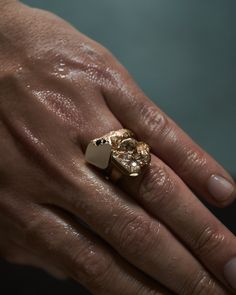 Face of the signet ring is slightly angled to give it more extraordinary look in classic form. Rough texture on the sides with deep matte finish. Flat, high polished on top and satin finished on the inside. 3mm deep red garnet and 1.4mm black diamond hidden in the detail. Hand carved and finished using artisan techniques. Made of solid 14k (585) yellow gold. Due to the price of gold, different sizes have different prices. Note that all products are made to order. Please allow approximately 3-6 w Unique Guy Gifts, Men Pinky Ring, Mens Gold Signet Rings, Mens Signet Ring, Male Ring, Mens Ring Designs, Mens Gemstone Rings, Rough Texture, Mens Gold Rings