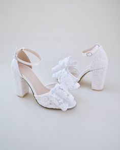 Fun and flirty block heel sandals in crochet lace with added an oversized crochet lace bow will create a dainty yet classic look to any occasions. An elegance and classic addition to your wedding look, bridesmaids, party, prom, date night, and any special occasions.DETAILS:HEELS: 3.75 inchesUPPER: Synthetic upper and liningMATERIALS: Manmade outsoleORIGIN: Imported Shoes For Brides, Bridesmaids Party, Prom Date, Wedding Look, Block Heel Sandals, White Heels, Quince Dresses, Bride Shoes, Lace Bows