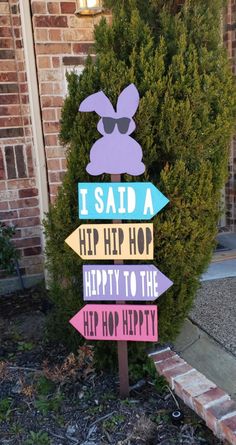 a wooden sign that says i said a hip hop happy to the hip hoppy