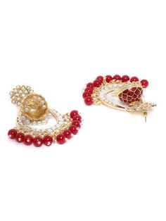 These beautiful maroon (deep red) dome shaped jhumka earrings come with kundan stone studs & beads, are gold-plated and are secured with a post and back closure. These handcrafted jhumkas can be paired with any traditional outfit to add a punch of colorful boost, and help you stand out. Product color may vary based on the monitor or screen you are using.See FAQ for more details. Size Length: 9.5 cm Details Material: BrassStones: Kundan & Artificial BeadsPlating: Gold-plated Festive Kundan Chandelier Earrings With Dangling Beads, Traditional Kundan Earrings With Dangling Beads, Ruby Chandbali Earrings With Stone Work, Red Ruby Chandbalis For Diwali, Celebration Chandbali Danglers With Dangling Beads, Traditional Diwali Earrings With Dangling Beads, Festive Chandbalis With Dangling Beads For Diwali, Festive Temple Jewelry Chandelier Earrings With Dangling Beads, Festival Celebration Ruby Chandbalis