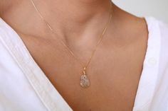 This beautiful necklace features a genuine  Rutilate Quartz and a dainty 18k gold-filled chain. This dainty piece is great for everyday wear and a perfect layering piece.    G E M S T O N E     * Golden Rutilated Quartz   * Stones measure approx. 18 mm * Due to the one-of-a-kind nature of the stones, they may vary slightly in size, color, hue, and reflection.  C H A I N    * All chains are 18k gold-filled. * 18k gold-filled jewelry is created with a thick layer of 18k solid gold over a metal cor Minimalist Jewelry With Natural Inclusions For Everyday, Minimalist Everyday Jewelry With Natural Inclusions, Delicate 14k Gold Filled Crystal Necklaces For Gift, Gold Quartz Necklace With Spiritual Style, Adjustable 14k Gold-filled Gemstone Necklace, Delicate Hypoallergenic 14k Gold-filled Necklace, Gold Bad, Elegant 14k Gold-filled Crystal Necklace Gift, Rutilated Quartz Necklace