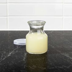 a bottle of milk sitting on top of a counter