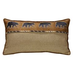 a brown and black pillow with bears on it