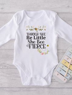 BEEautiful infant long sleeved infant bodysuit ready for the bee-loving family! Bodysuits are 100% cotton with plastic snap closures for easy changing. Durable, light and gorgeous!  Perfect gift for an upcoming baby-to-BEE, mom-to-BEE or for the BEE-DAY girl! We love our honeybees and enjoy spreading the word of these amazing creatures! Bee Day, Outfit Birthday, Bee Baby, Loving Family, Baby Bee, New Baby Gift, Baby Outfit, Baby Outfits, Baby Shirts