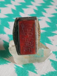 Antique silver ring. ISLAMIC ART, PROBABLY AFGHAN FROM THE 19TH CENTURY No stamp. We will notice some slight traces of use. Size (20) EU Spain / France (60) / United States (9) / England (R 1/2) / Red Intaglio Rings For Anniversary, Collectible Red Engraved Ring, Antique Red Rectangular Rings, Antique Red Engraved Ring, Vintage Red Engraved Ring For Gift, Red Carved Vintage Rings, Red Vintage Carved Rings, Vintage Red Carved Rings, Vintage Red Engraved Signet Ring