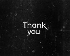 a black and white photo with the words thank you written in white ink on it