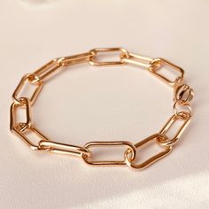 Chic, bold and beautiful!Perfect on its own or layered with other bracelets.Item Details:• This listing is for ONE(1) 14K gold-filled link bracelet.• All metal components are 14k gold filled.• Link Length 12mm, Width 6mm• All our work is custom-made by hand in our Coco Wagner, KS studio.• Fitted chain bracelet - no extender. no returns on this item as it is a custom size. HANDMADE TAKES TIME - Due to the handmade nature of our products, items generally ship within 3-5 business days. Wrist Measur Everyday Chunky Chain Link Bracelet, Chunky Elegant Bracelet For Everyday, Everyday Chunky Oval Link Bracelets, Everyday Gold Chunky Bracelets, Classic Chunky Everyday Jewelry, Modern Chunky Gold Bracelets, Gold Bracelet With Chunky Rectangular Links, Classic Chunky Jewelry As A Gift, Classic Chunky Jewelry As Gift