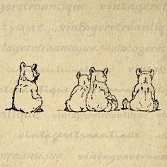 three teddy bears sitting next to each other on top of a piece of parchment paper