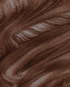 a close up view of some brown material