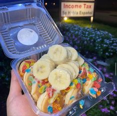 a plastic container filled with lots of banana slices