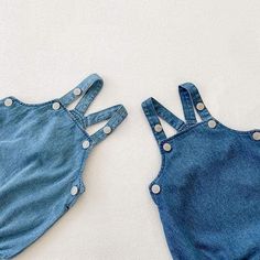 A denim bodysuit never goes out of style. Dress her up in this denim bodysuit featuring super soft denim fabric. This bodysuit includes an elastic openings at the legs and closure button straps to ensure a comfy fit perfect for any warm weather occasion. Pair with a cute denim hat or ruffle neck long sleeve on cooler days, for a complete outfit. Make your baby more lovely. Great for daily wear, birthday party, or baby photography. Material: COTTON Collar: O-Neck Item Type: Bodysuits Sleeve Lengt Denim Bodysuit, Traditional Skirts, Mother Daughter Dresses Matching, Beige Hat, Childrens Clothing Boutique, Rompers Online, Usa Baby, Rompers For Kids, Purple Hats