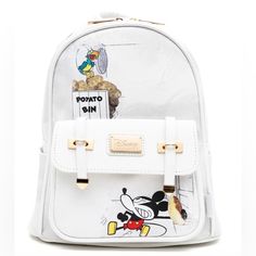 Official Disney Licensed Product! This Colorful Mini Backpack By Wondapop Features Mickey Mouse In His Original Role As Steamboat Willie With A Potato Bin Where He Peeled Potatoes. The Backpack Has Fabric Straps That Are Great For Putting Pins On. Backpack Measures - 11"H X 8.5"W X 4"D With A Front Pocket That Measures - 6 1/2"W X 4 1/4"H X 1"D. Made Of Faux Leather With Satin Nylon Lining And Metal Hardware Zipper Main Compartment. Mini Backpack Features Mickey Mouse As Steamboat Willie Backpac Disney Style Daily Backpack, Disney Backpack For Everyday Use, Disney Bags For Daily Use And Back To School, Daily Use Disney Backpack, Disney Bags For Everyday Use And Back To School, Pins On Backpack, Potato Bin, Mickey Mouse Steamboat Willie, Vegan Leather Backpack