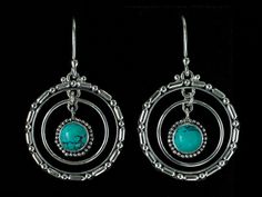 "Turquoise Hoop Earrings handcrafted in Sterling Silver with natural Tibetan Turquoise gemstones, dangling from Balinese-inspired textured hoops, representing the moon's orbit around the earth. * Handcrafted in the finest .925 Sterling Silver. * From the Karma Collection, inspired by the celestial sun, moon & earth. * 2- 6mm Tibetan Turquoise gemstones from India, to bring happiness, good luck, & spiritual grounding. * Each natural gemstone is unique and may vary slightly and the amount Spiritual Grounding, Balinese Style, Silver Turquoise Earrings, Celestial Sun, Turquoise Hoop Earrings, Silver Turquoise Jewelry, Turquoise Hoops, Earth 2, Turquoise Drop Earrings