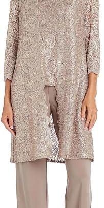 Plus Size Lace Outfit Sequined Lace Pant Suit This elegant US-made 3-piece set from features a sleeveless metallic lace top paired with straight-leg trousers and a scalloped-hem jacket. The versatile pieces can be mixed and matched for day-to-evening elegance. 1. #PlusSizeFashion 2. #LacePantSuit 3. #SequinedStyle 4. #RMRichards 5. #WomensFashion 6. #PlusSizeStyle 7. #LaceOutfit 8. #EveningWear 9. #SpecialOccasion 10. #PlusSizeGlam Plus Size Bride, Curvy Petite Fashion, Net Lace, Lace Pants, Lace Outfit, Girly Dresses, Lace Jacket, Top And Pants Set