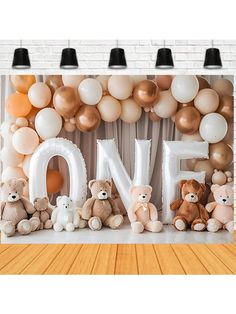 there are many balloons and teddy bears in front of the love sign on the wall