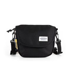 Small-Canvas-Crossbody-Bag-front-black-color Cheap Men's Rectangular Shoulder Bag, Large Capacity Canvas Shoulder Bag For Streetwear, Daily Use Canvas Crossbody Chest Bag, Daily Use Crossbody Chest Bag In Canvas, Urban Crossbody Chest Bag For Daily Use, Crossbody Shoulder Bag With Mobile Phone Bag For Streetwear, Functional Canvas Crossbody Shoulder Bag, Canvas Crossbody Chest Bag With Adjustable Strap, Functional Canvas Bags For Streetwear