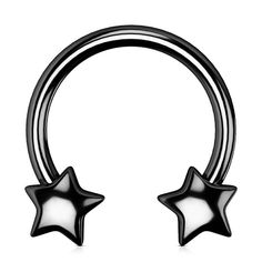 a pair of black and white star shaped nose rings