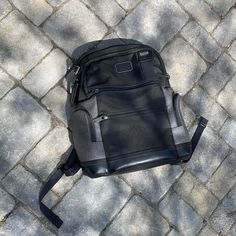 Tumi Travel Backpack Nwot Gray Rectangular Backpack With Zipper Pocket, Luxury Gray Bag With Zipper Closure, Gray Shoulder Bag With Gunmetal Hardware For Travel, Gray Travel Backpack With Zipper Pocket, Gray Satchel Backpack For Travel, Functional Rectangular Backpack For Errands, Black Versatile Backpack, Gray Standard Backpack, Black Travel Backpack With Gunmetal Hardware