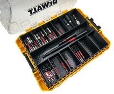 an open tool box filled with tools on top of a white surface