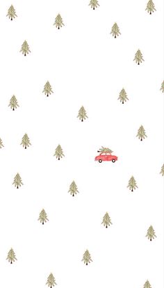 a small red car driving through a forest filled with trees on a white wallpaper background