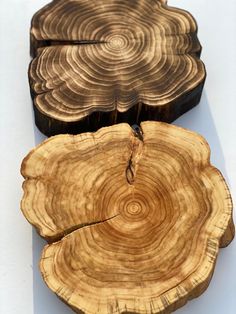 three pieces of wood that have been cut in half