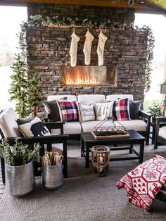 a living room filled with furniture and a fire place