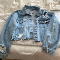 Forever 21 Light Denim Cropped Jean Jacket. Size S. Worn Once On A Trip And In Perfect Condition! Just Don’t Need Anymore. Basically Brand New Condition! Ripped Cropped Fall Outerwear, Cropped Ripped Outerwear For Fall, Ripped Cropped Outerwear For Fall, Trendy Ripped Button-up Outerwear, Trendy Medium Wash Outerwear For Day Out, Cropped Ripped Medium Wash Outerwear, Trendy Ripped Cropped Outerwear, Medium Wash Cropped Ripped Outerwear, Trendy Light Wash Outerwear