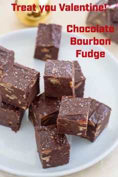 chocolate bourbon fudge on a plate with the words treat you valentine's chocolate bourbon fudge