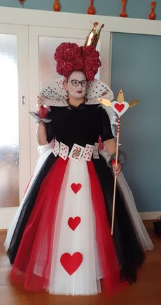 a woman dressed up as a queen of hearts