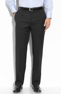 Italian wool adds a luxe style to staple flat-front trousers that offer a smart, modern look. 11" front rise; 17 1/2" back rise (size 60) 100% wool Dry clean Made in Italy Black Dress Pants With Concealed Placket For Business, Black Wool Business Pants, Black Wool Pants For Business, Black Flat Front Dress Pants For Business, Full Length Wool Suit For Business, Full Length Wool Business Suits, Wool Full-length Business Suit, Black Wool Pants For Semi-formal Occasions, Semi-formal Black Wool Pants