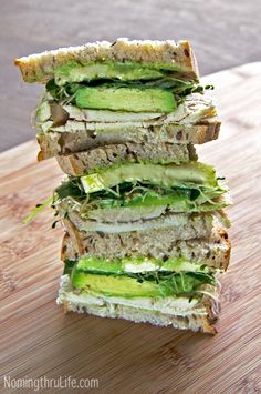 four sandwiches stacked on top of each other